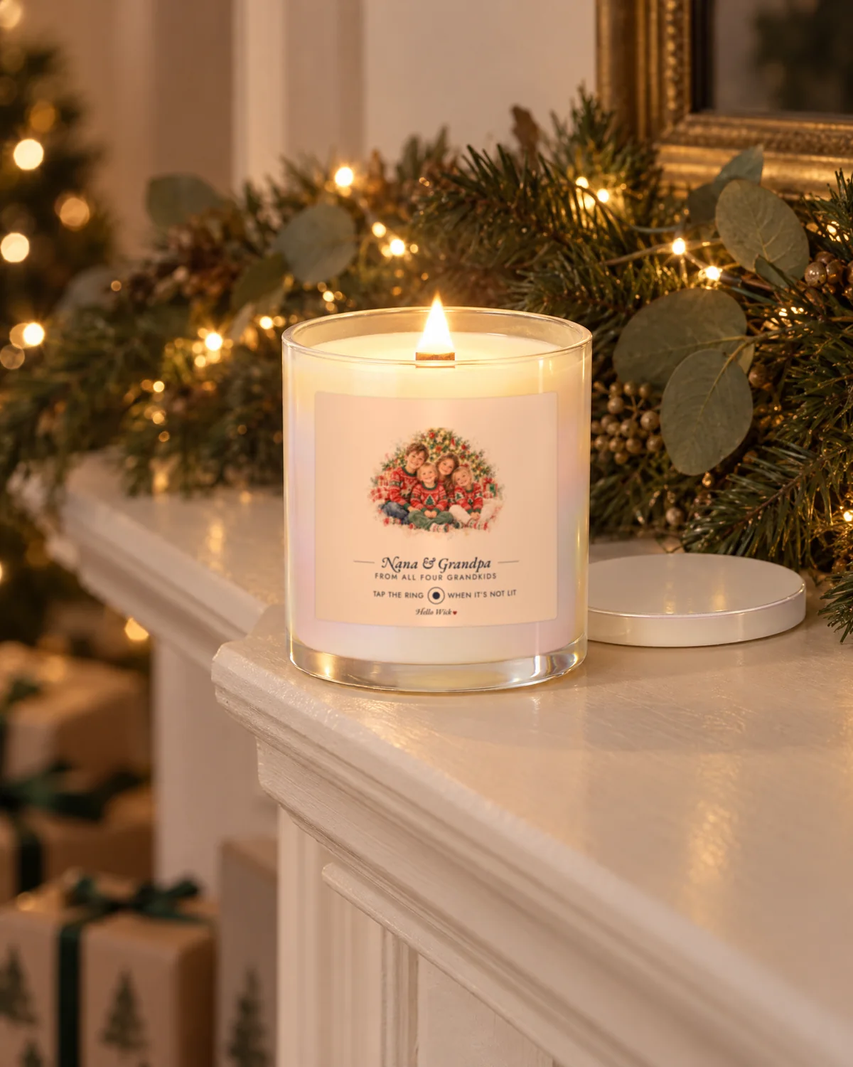 Placeholder photo: a lit Hello Wick candle labelled Nana & Grandpa on a mantel with garland