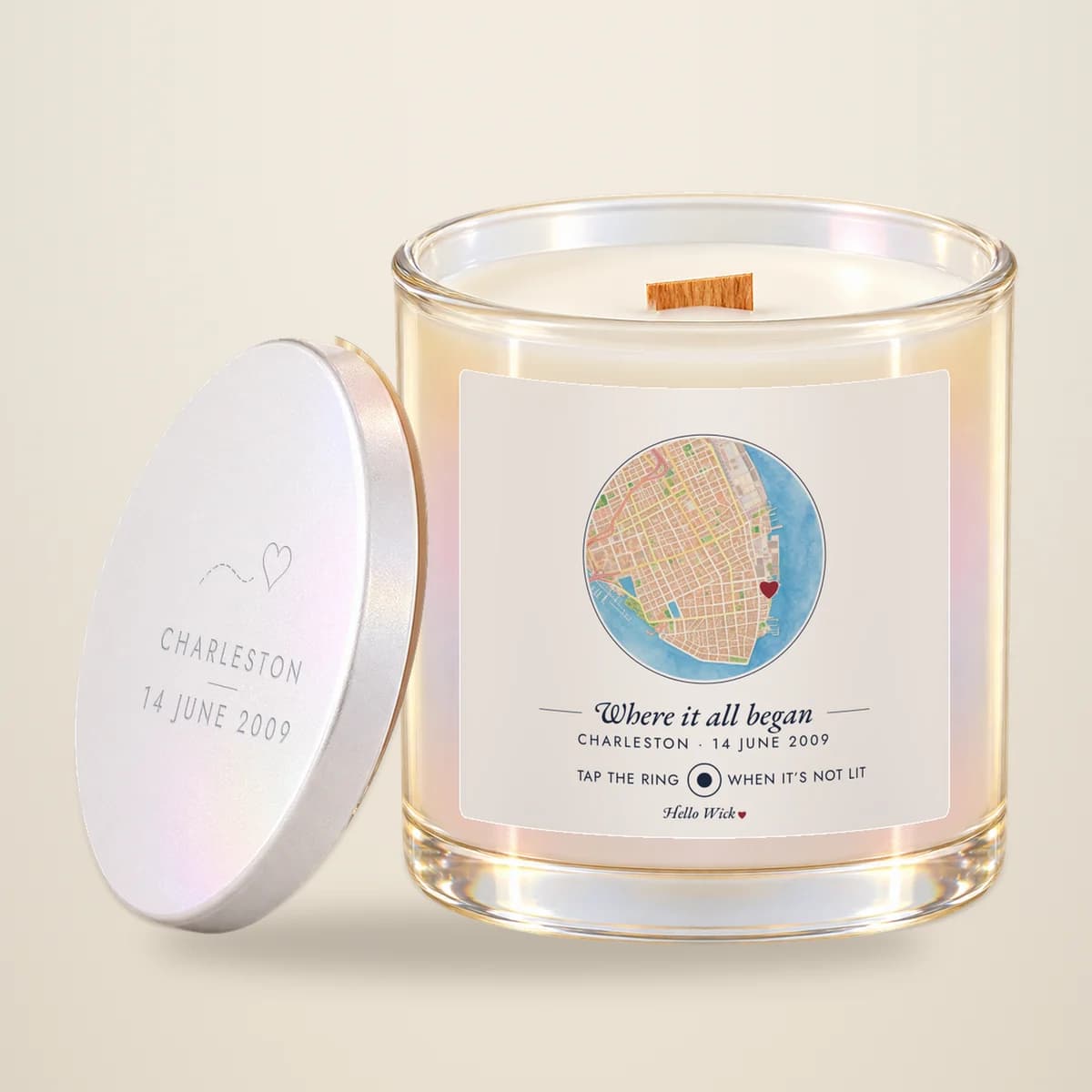 A Hello Wick candle labelled Where it all began, with a round watercolour map of Charleston and a heart