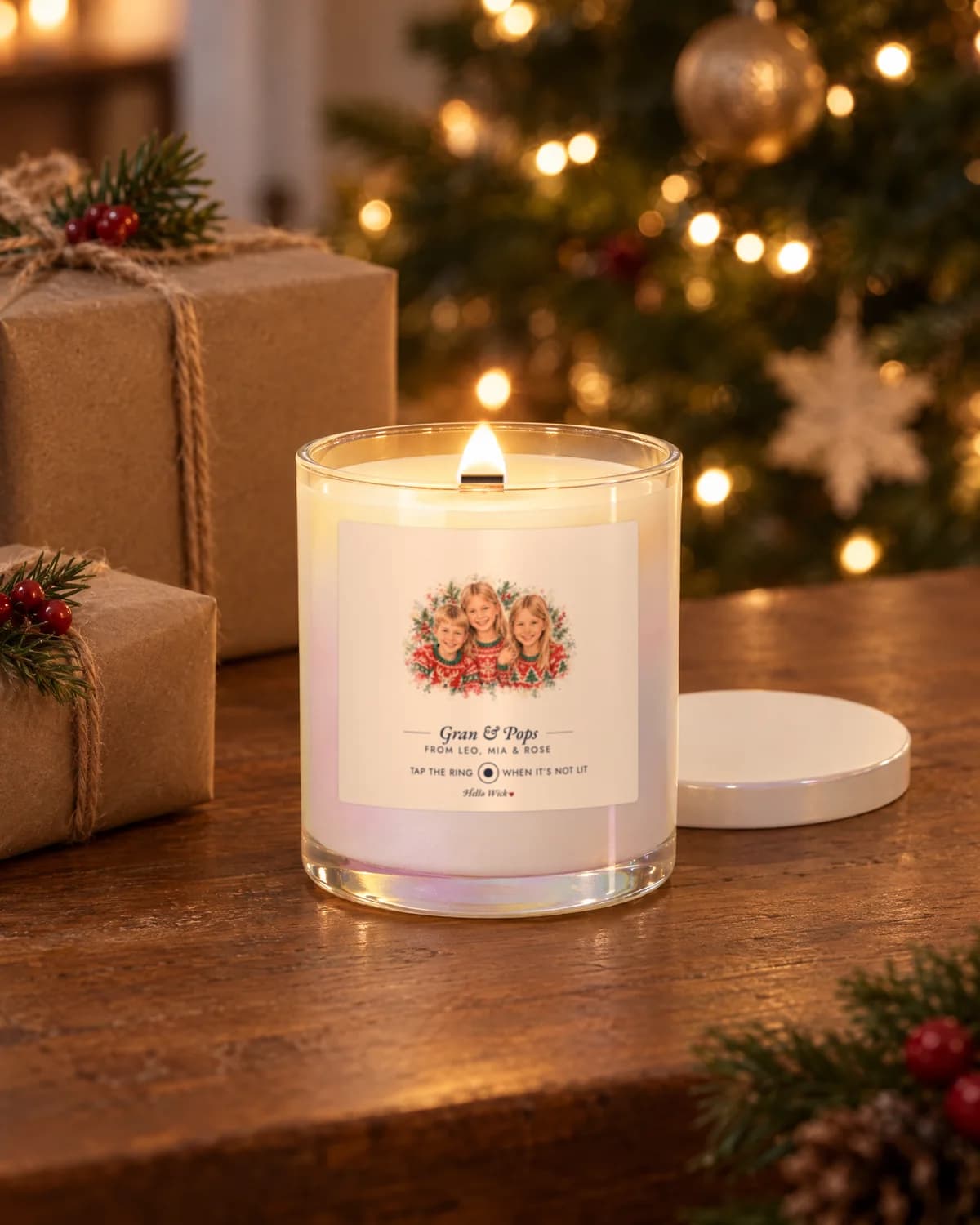 Placeholder photo: a lit Hello Wick candle labelled Gran & Pops under the Christmas tree